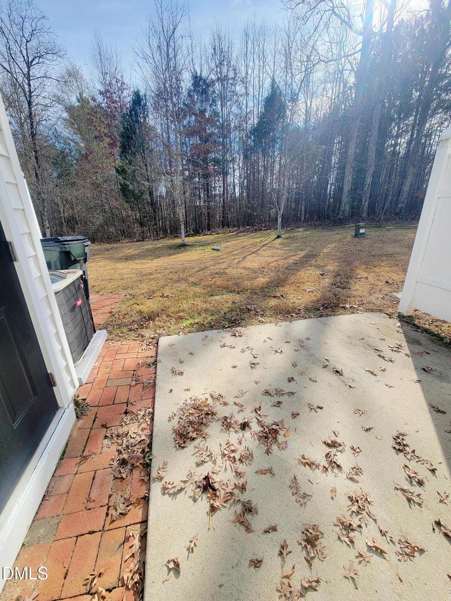 1407 Plexor Lane Knightdale, NC 27545 - Photo 35 of 43 a view of a yard with wooden fence
