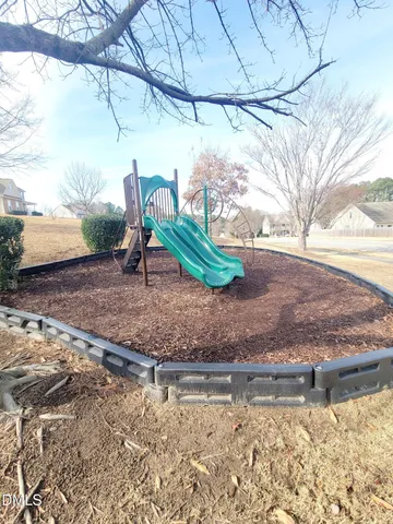 a view of swimming pool from a balcony