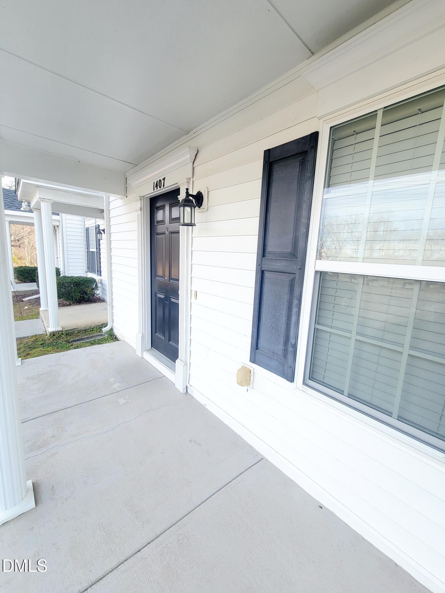 1407 Plexor Lane Knightdale, NC 27545 - Photo 41 of 43 a view of house with front door