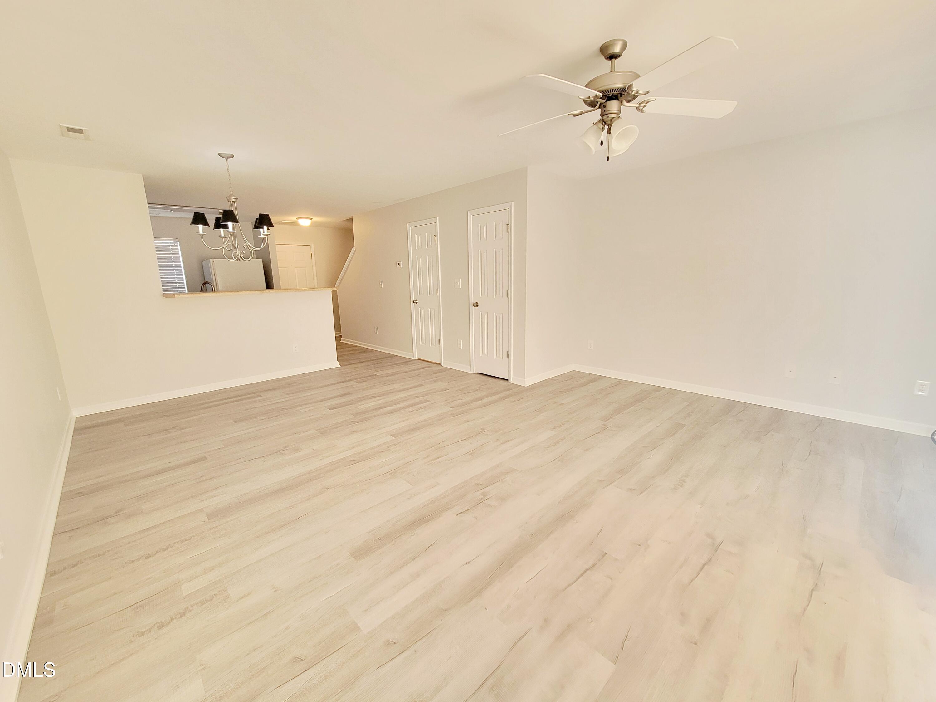 1407 Plexor Lane Knightdale, NC 27545 - Photo 10 of 43 a view of a room with a ceiling fan