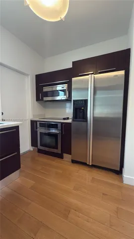 a utility room with washer and dryer