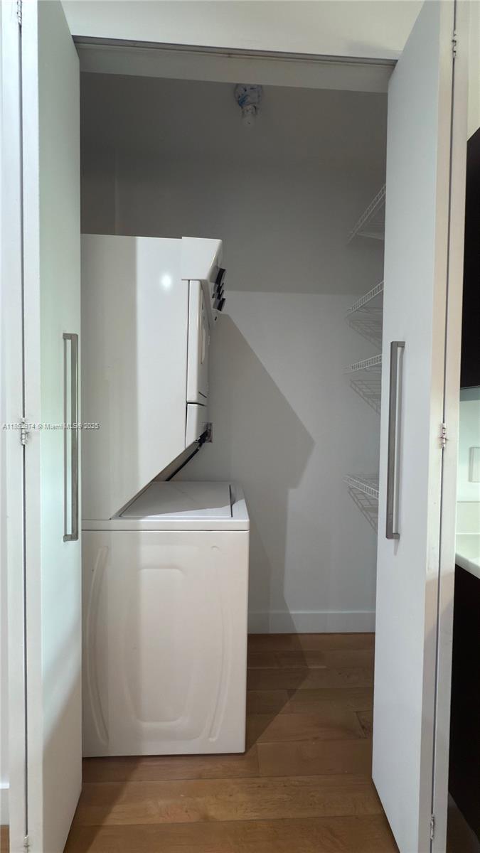 2021 Meridian Avenue, Unit 11 Miami Beach, FL 33139 - Photo 9 of 22 a utility room with washer and dryer