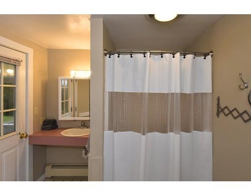 151 Cherry Street Ashland, MA 01721 - Photo 17 of 42 a bathroom with a sink and a mirror