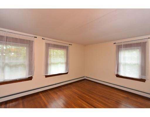 151 Cherry Street Ashland, MA 01721 - Photo 24 of 42 a view of an empty room with wooden floor and a window