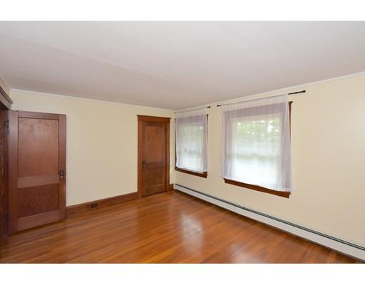 151 Cherry Street Ashland, MA 01721 - Photo 25 of 42 an empty room with wooden floor and windows
