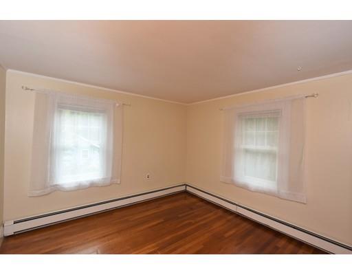 151 Cherry Street Ashland, MA 01721 - Photo 26 of 42 a view of an empty room with wooden floor and a window