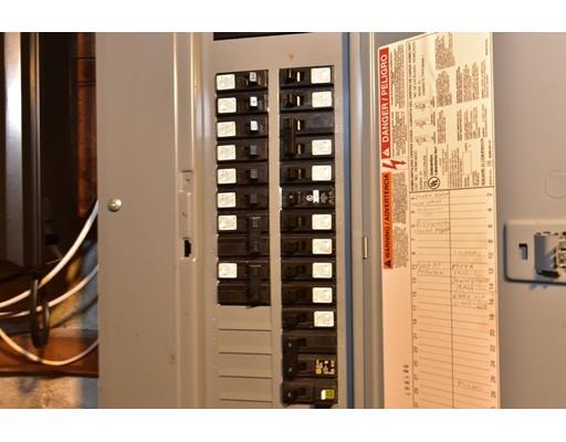 151 Cherry Street Ashland, MA 01721 - Photo 32 of 42 a bathroom with a sink and a mirror