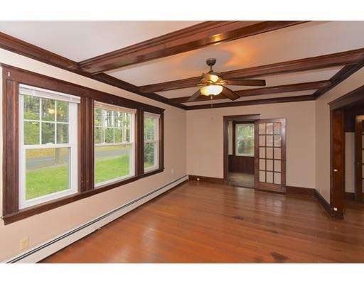151 Cherry Street Ashland, MA 01721 - Photo 4 of 42 a view of an empty room with wooden floor and a window