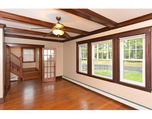 151 Cherry Street Ashland, MA 01721 - Photo 7 of 42 a view of an empty room with wooden floor and a window
