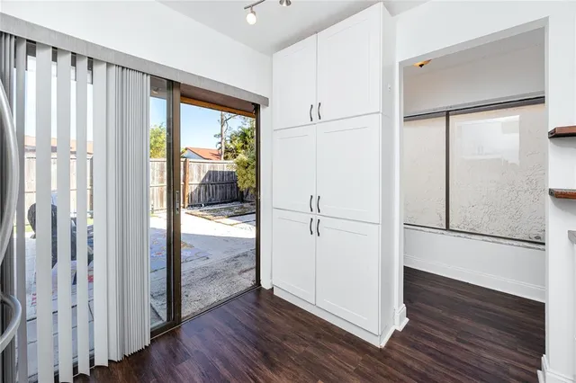 a view of entryway with wooden floor