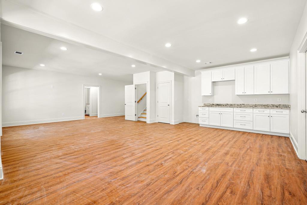 707 Vickery Street Extension Hartwell, GA 30643 - Photo 37 of 50 A spacious, unfinished basement offers endless possibilities for customization and future expansion.