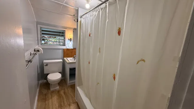 a bathroom with a sink and mirror