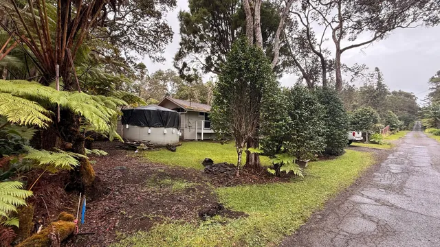 a car parked in front of a house