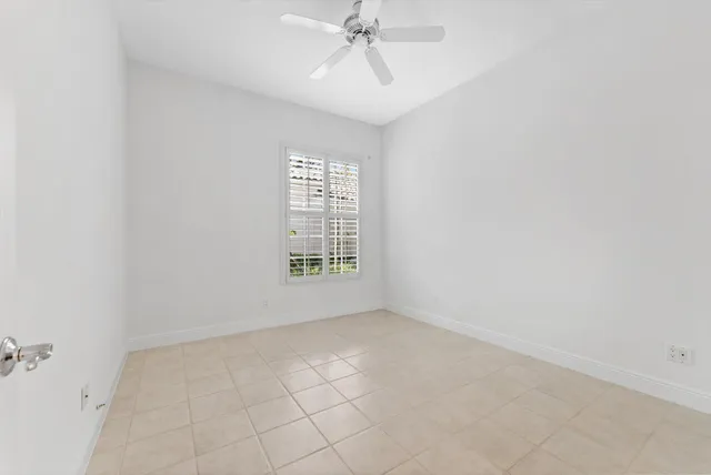 a bathroom with a sink a toilet a tub and a mirror