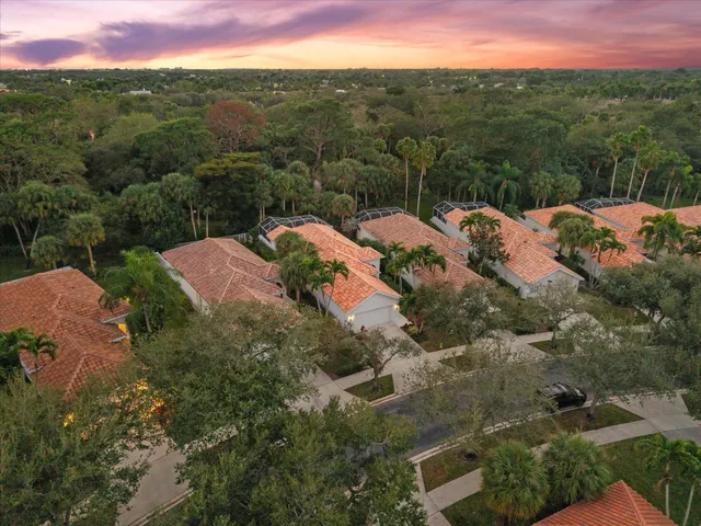 a view of an house with backyard space and garden