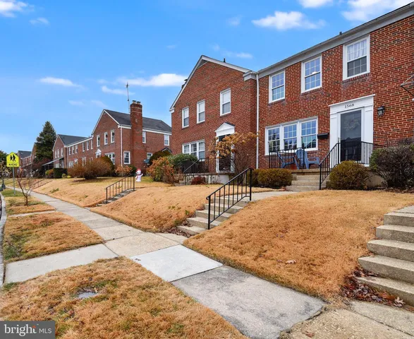 a street view along with residential houses