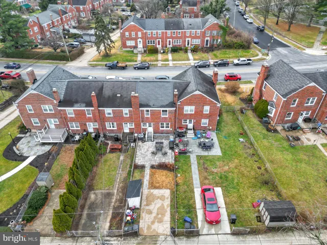a living room with furniture window and a fireplace