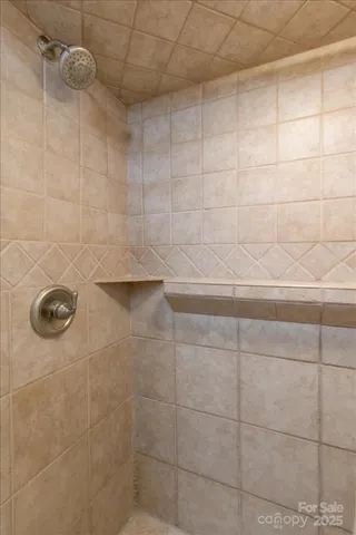 a room with a bed and window