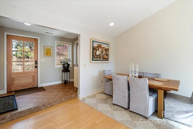 a view of a livingroom with furniture and a fireplace
