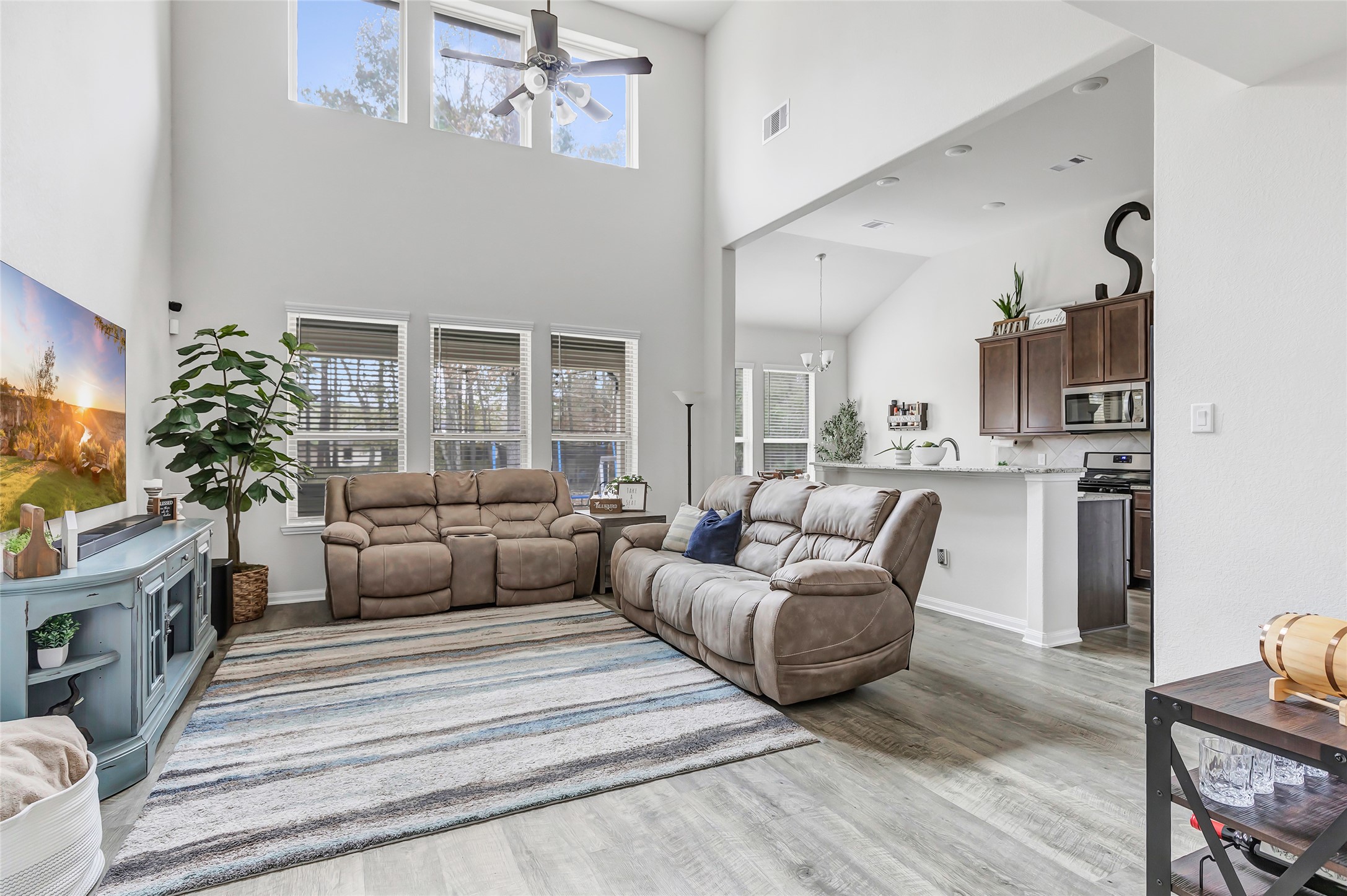 28511 Riverside Crest Lane Houston, TX 77336 - Photo 12 of 41 a living room with furniture and a fireplace