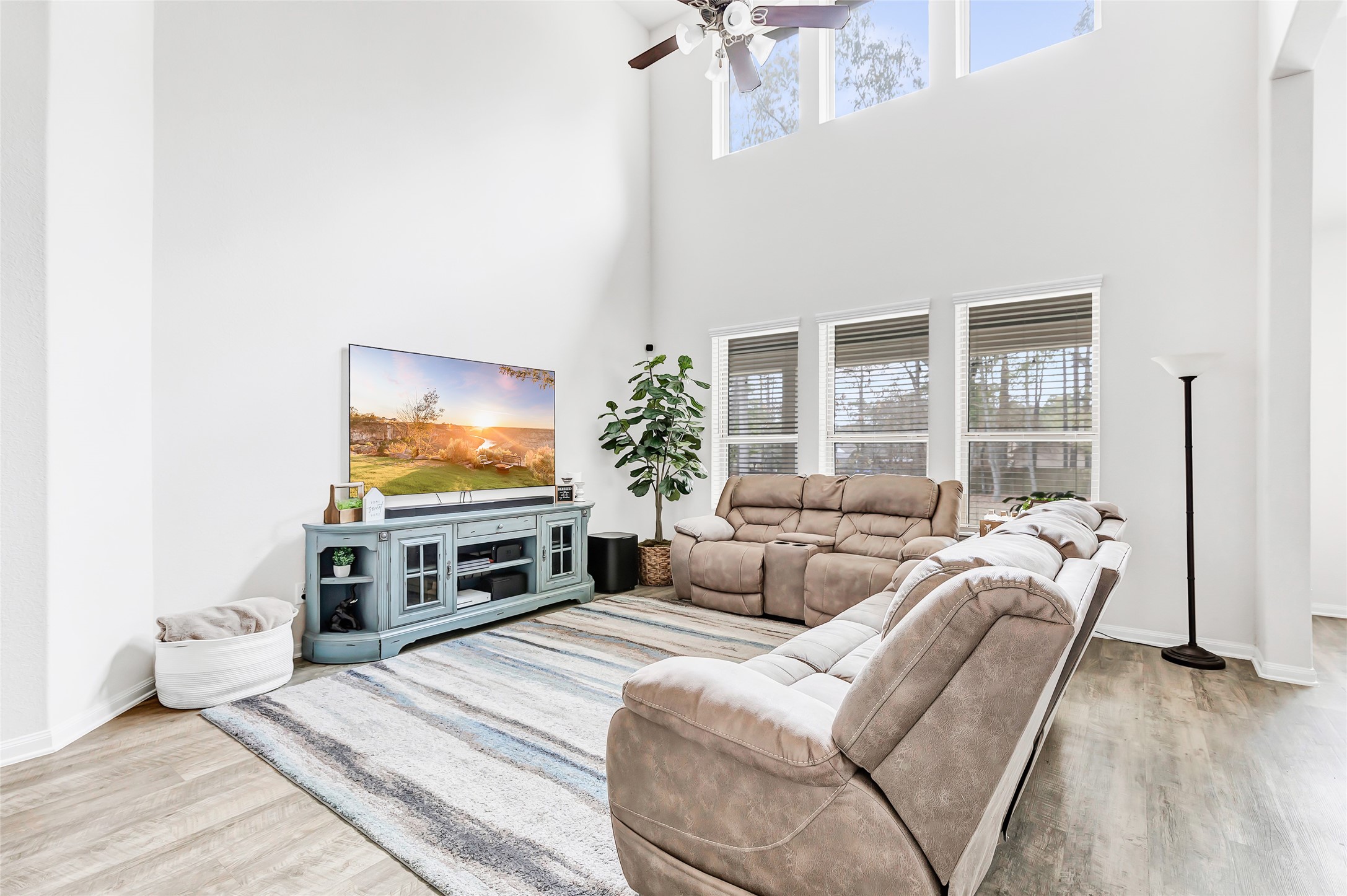 28511 Riverside Crest Lane Houston, TX 77336 - Photo 14 of 41 a living room with furniture and a flat screen tv
