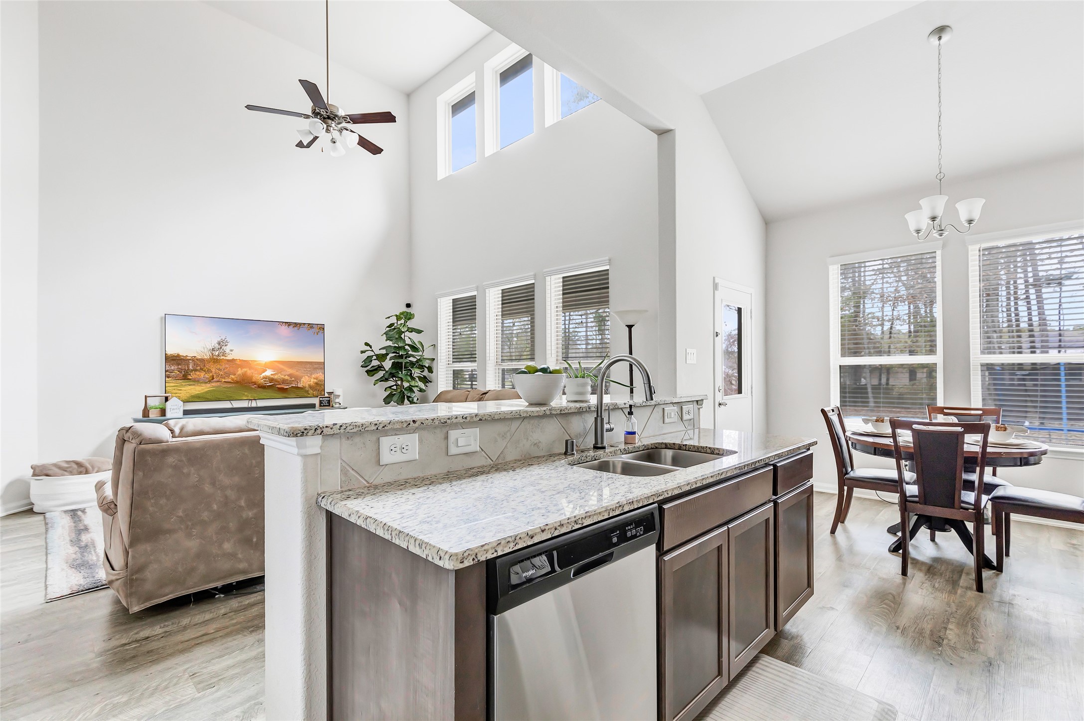 28511 Riverside Crest Lane Houston, TX 77336 - Photo 19 of 41 a kitchen with a stove a sink and a refrigerator