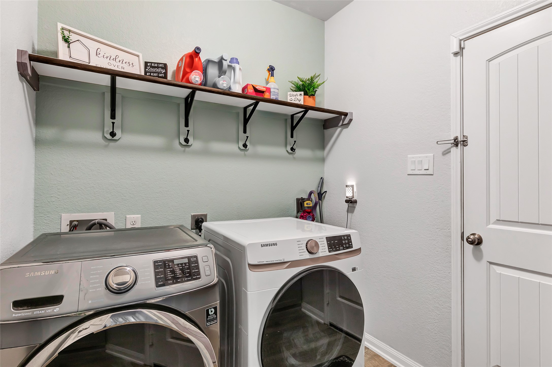 28511 Riverside Crest Lane Houston, TX 77336 - Photo 22 of 41 a utility room with dryer and washer