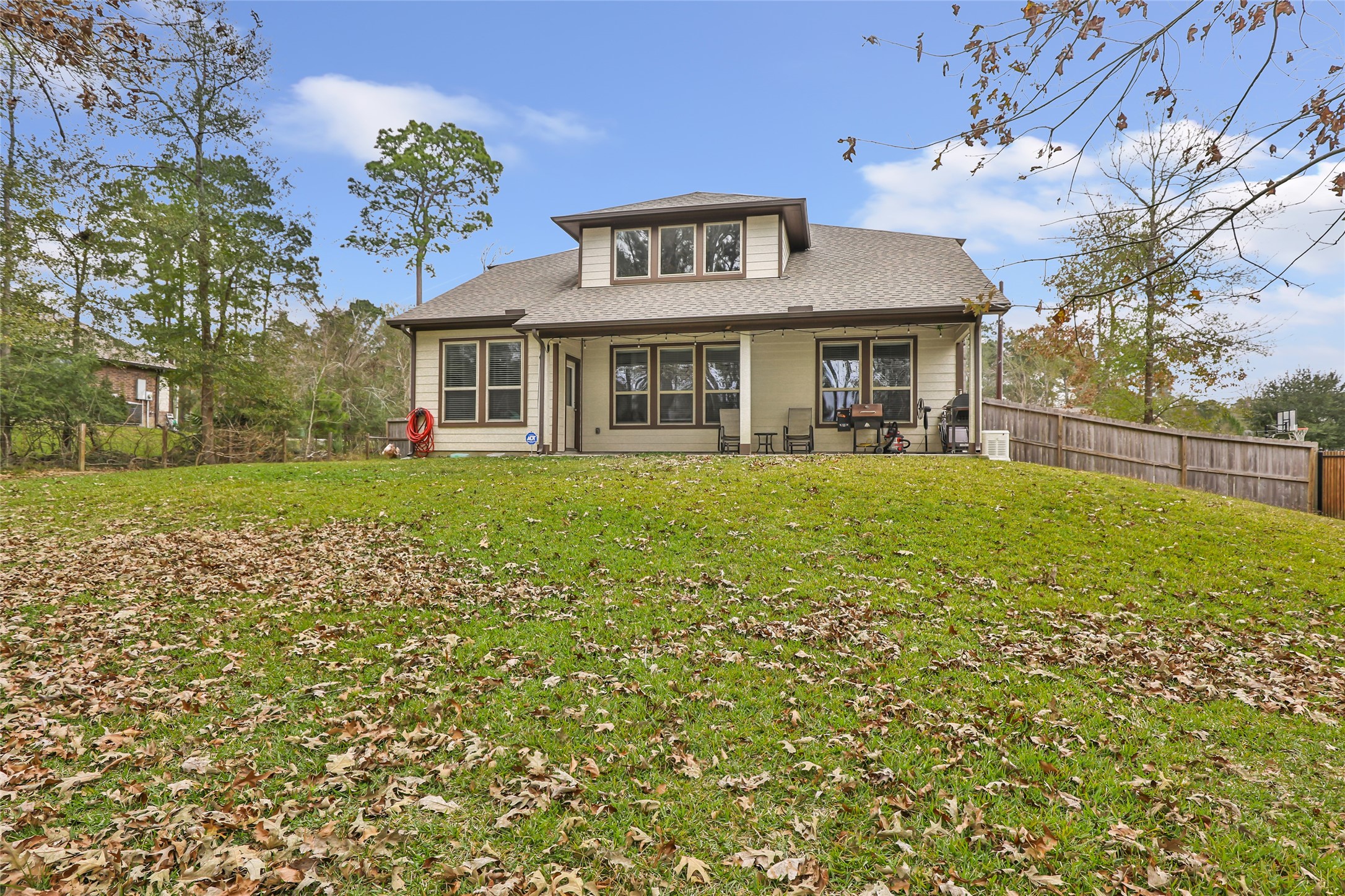 28511 Riverside Crest Lane Houston, TX 77336 - Photo 41 of 41 a front view of a house with a garden