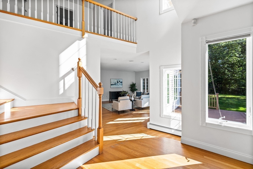 1 Fox Hunt Lane Winchester, MA 01890 - Photo 12 of 38 a view of a living room and entryway