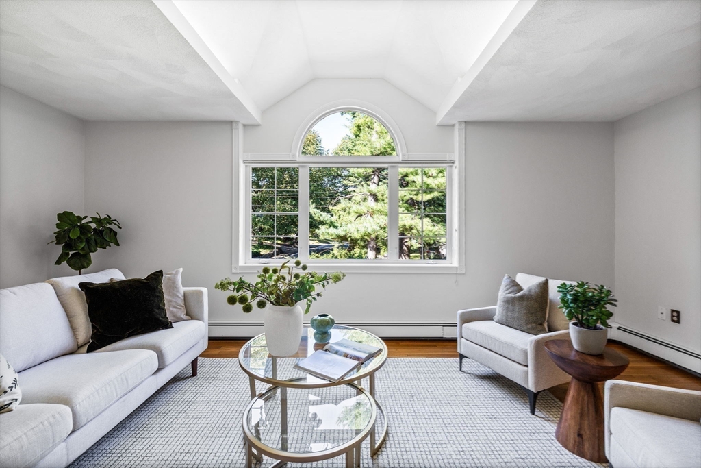 1 Fox Hunt Lane Winchester, MA 01890 - Photo 15 of 38 a living room with furniture and a large window
