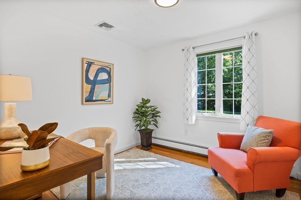 1 Fox Hunt Lane Winchester, MA 01890 - Photo 23 of 38 a living room with furniture and a window