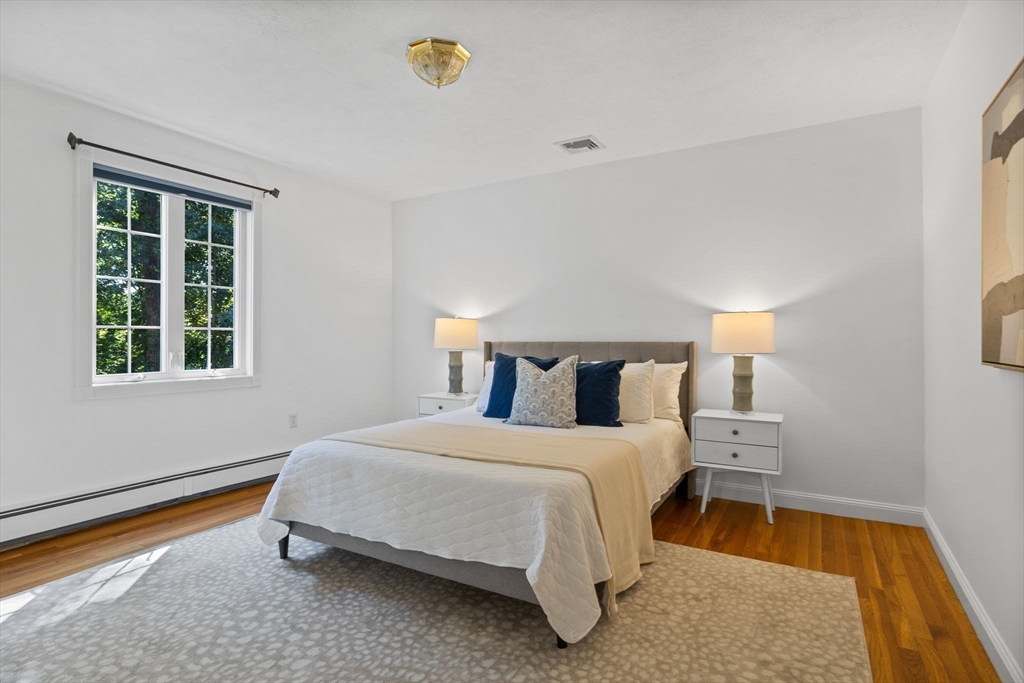 1 Fox Hunt Lane Winchester, MA 01890 - Photo 25 of 38 a bedroom with a bed and a window