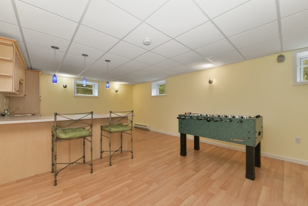 1 Fox Hunt Lane Winchester, MA 01890 - Photo 29 of 38 a view of a room with furniture and wooden floor