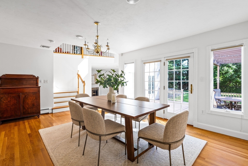 1 Fox Hunt Lane Winchester, MA 01890 - Photo 3 of 38 a view of a dining room with furniture window and wooden floor