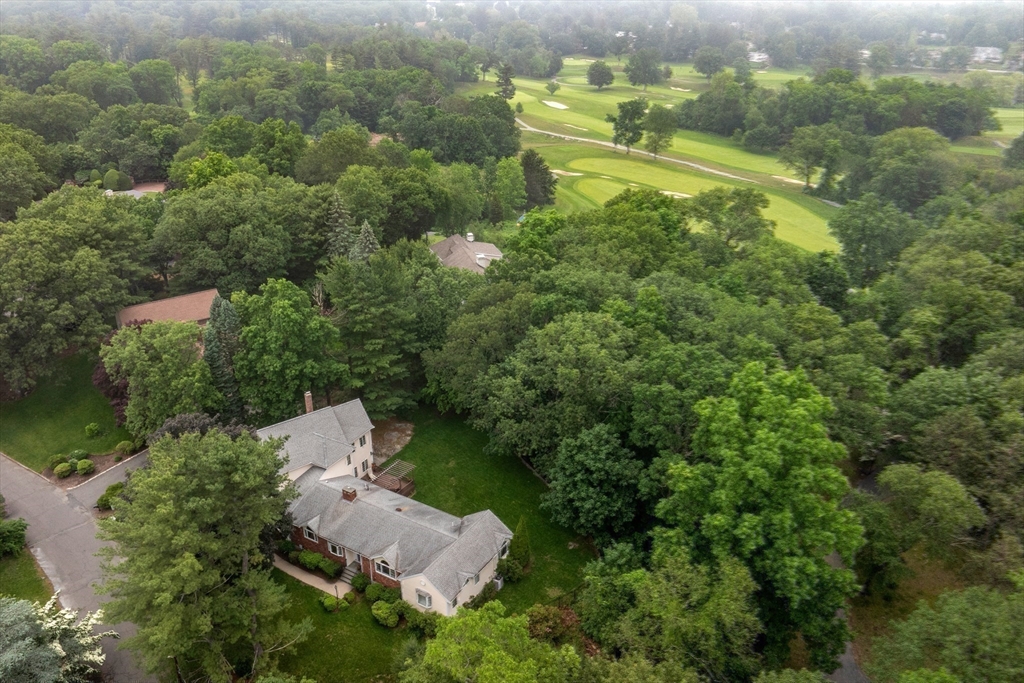 1 Fox Hunt Lane Winchester, MA 01890 - Photo 37 of 38 an aerial view of a house with a yard and lake view