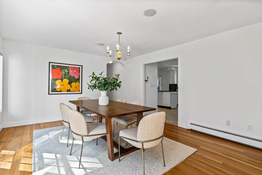 1 Fox Hunt Lane Winchester, MA 01890 - Photo 4 of 38 a view of a dining room with furniture and wooden floor