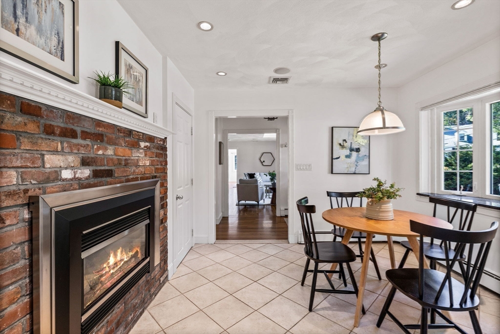 1 Fox Hunt Lane Winchester, MA 01890 - Photo 10 of 38 a dining room with furniture and window
