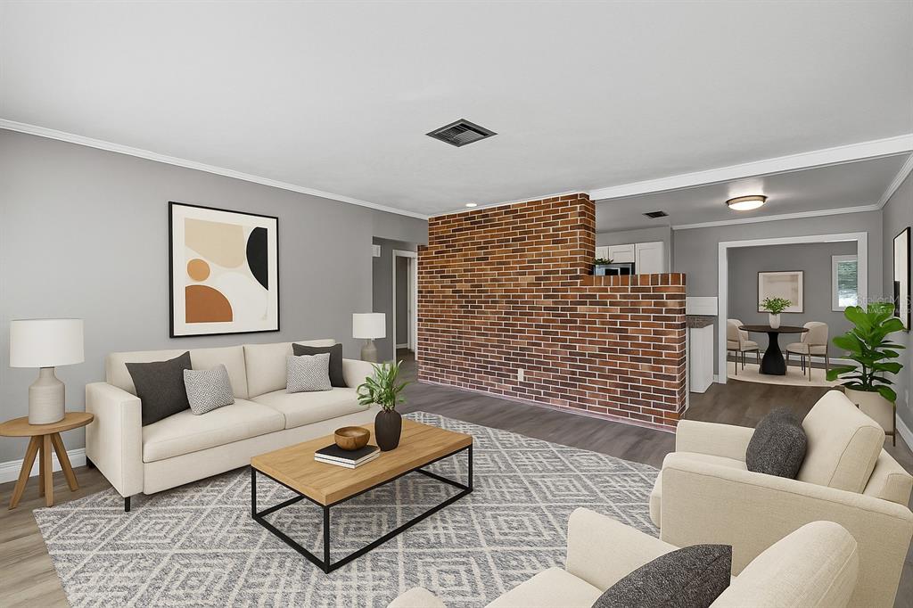 5046 99th Way North St. Petersburg, FL 33708 - Photo 2 of 41 a living room with furniture and a rug