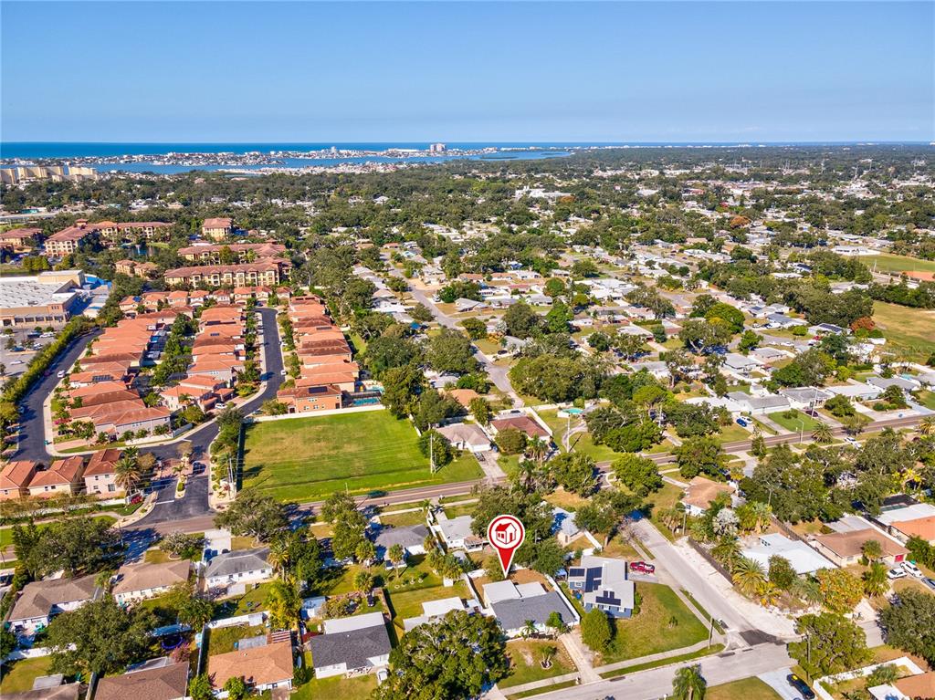 5046 99th Way North St. Petersburg, FL 33708 - Photo 27 of 41 an aerial view of residential houses with outdoor space