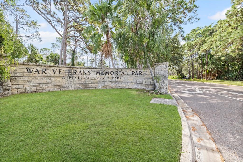 5046 99th Way North St. Petersburg, FL 33708 - Photo 35 of 41 a view of park with sign board