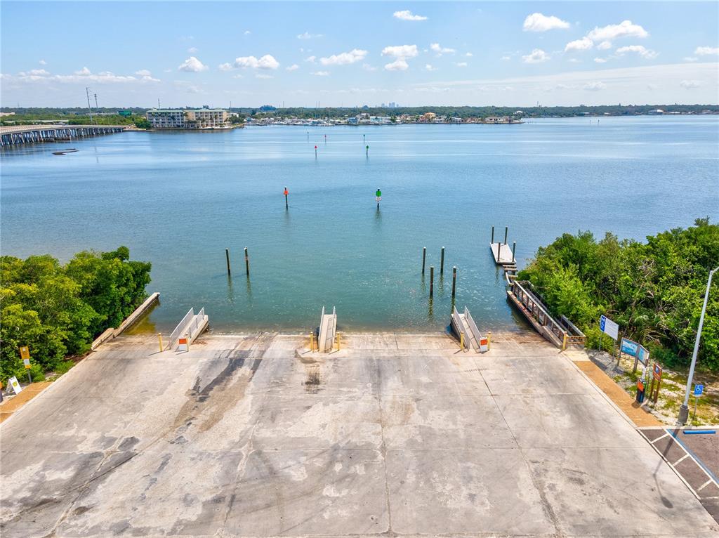 5046 99th Way North St. Petersburg, FL 33708 - Photo 37 of 41 a view of a lake with a mountain in the background