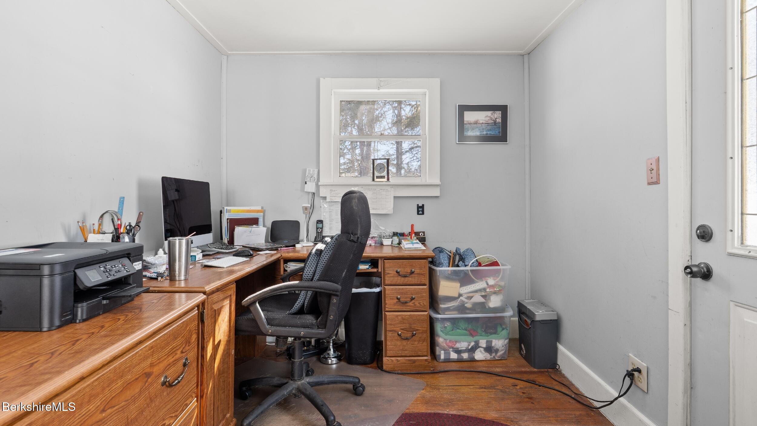 93 South Main Road Otis, MA 01253 - Photo 18 of 27 a view of a workspace with furniture and a window