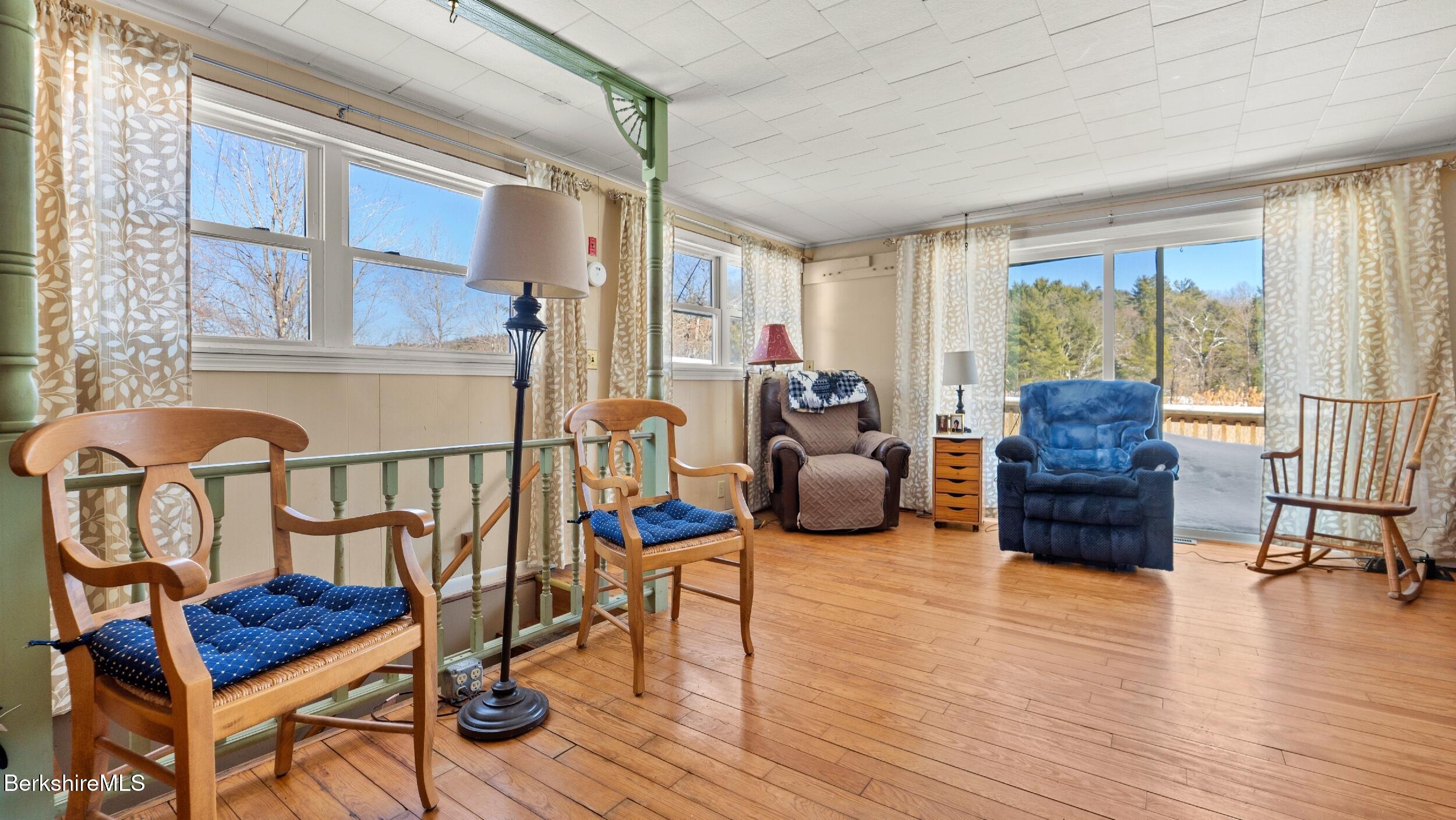 93 South Main Road Otis, MA 01253 - Photo 19 of 27 a living room with furniture and a wooden floor