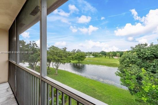 13255 Southwest 7th Court, Unit 403D Pembroke Pines, FL 33027 - Photo 18 of 19 a view of lake from a balcony