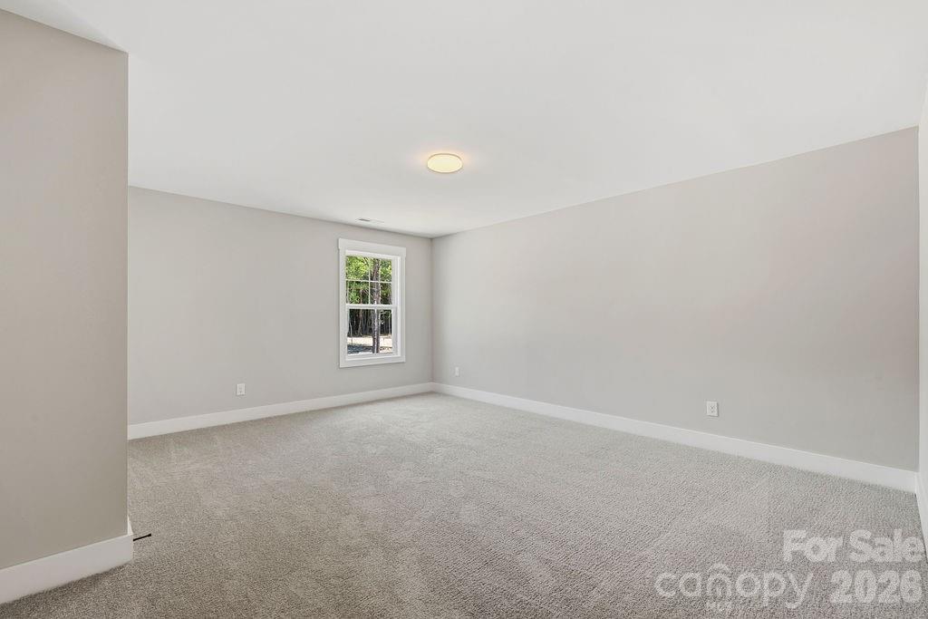 1024 Baylor Grove Road, Unit 19 Monroe, NC 28112 - Photo 34 of 47 a view of an empty room with a window