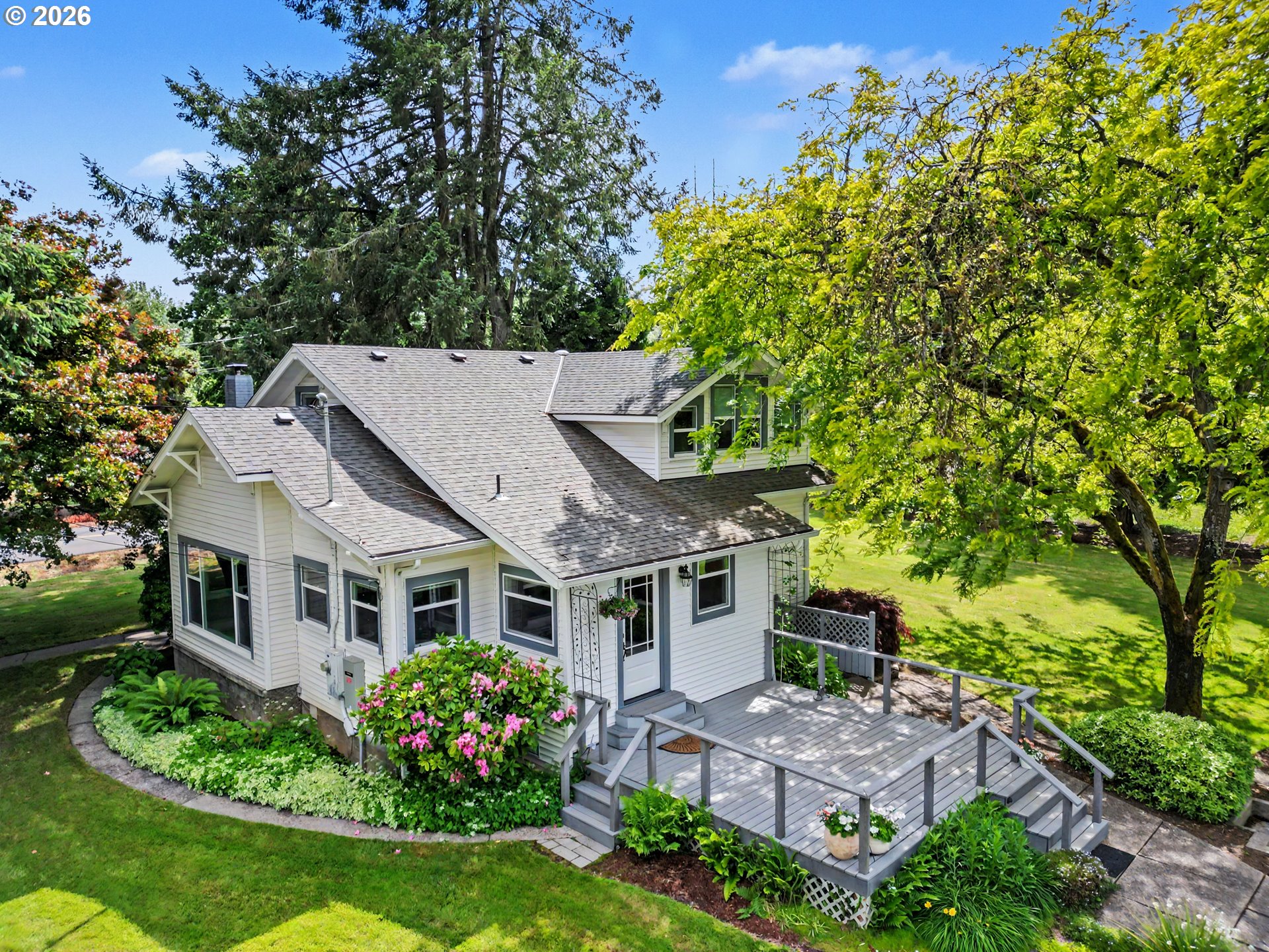15055 Southeast Foster Road Dayton, OR 97114 - Photo 1 of 47 front view of a house with a garden
