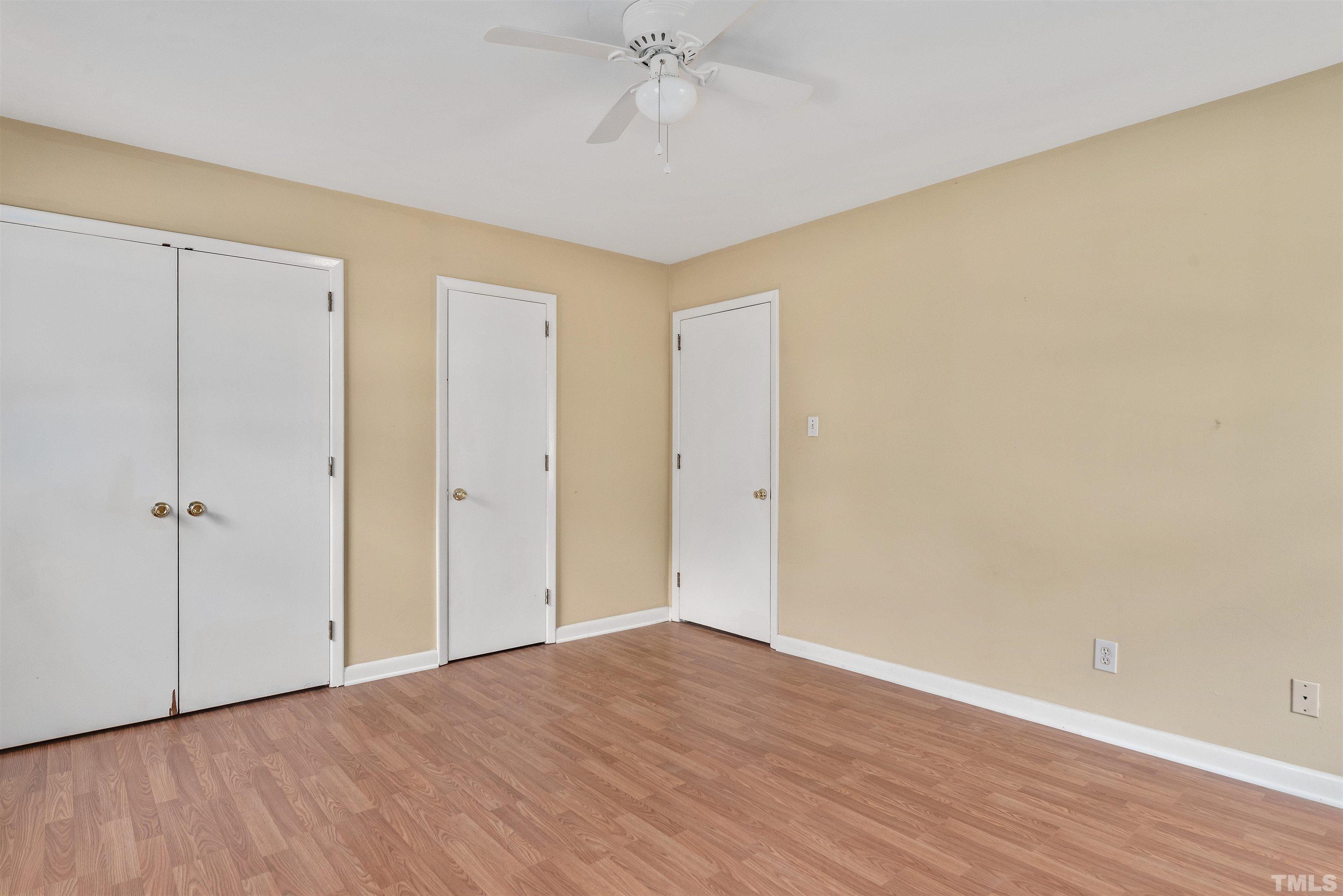 711 Latta Street Raleigh, NC 27607 - Photo 16 of 30 a view of an empty room with wooden floor