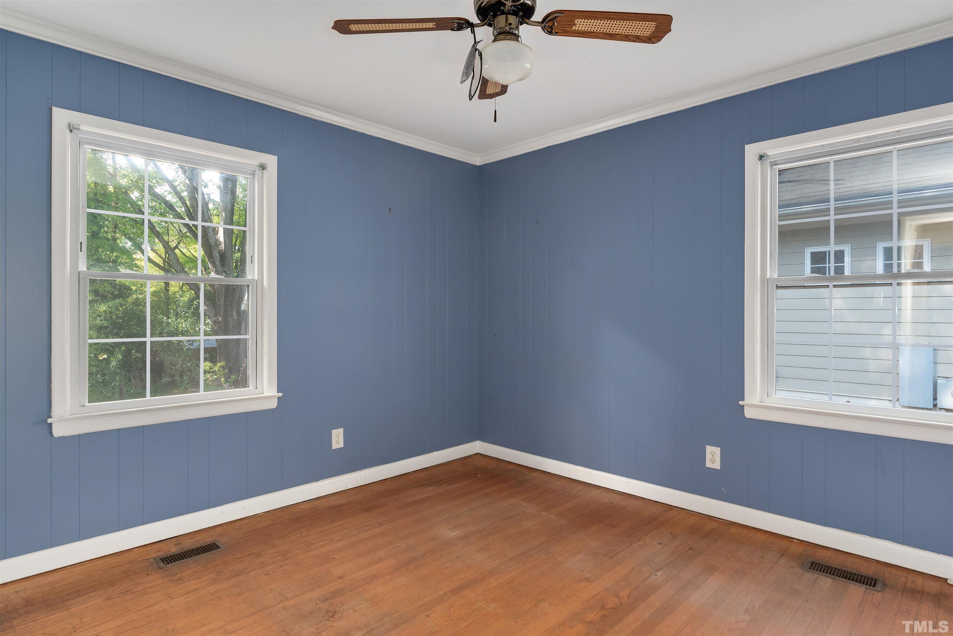 711 Latta Street Raleigh, NC 27607 - Photo 17 of 30 a view of an empty room with a window