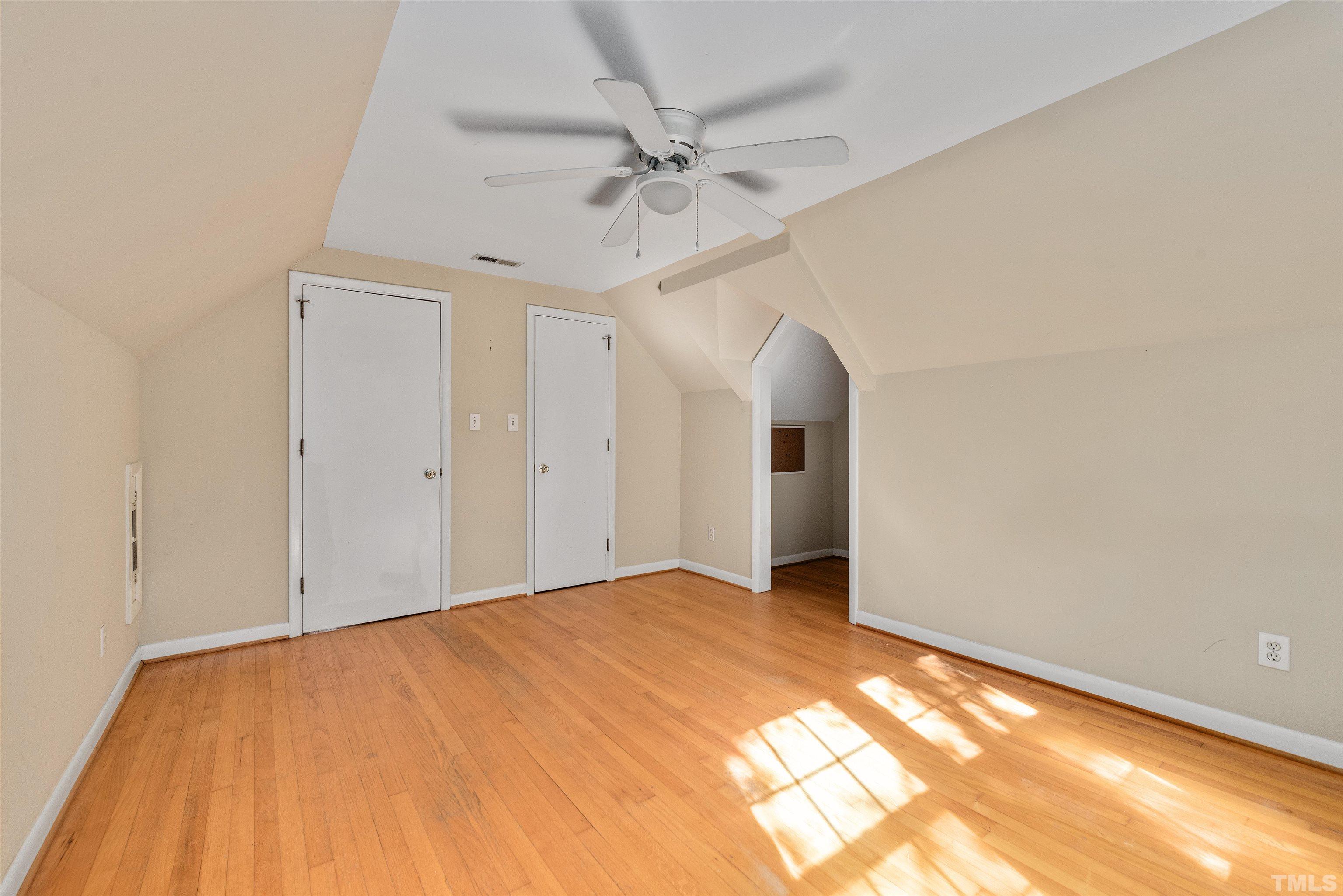 711 Latta Street Raleigh, NC 27607 - Photo 20 of 30 a view of a big room with wooden floor