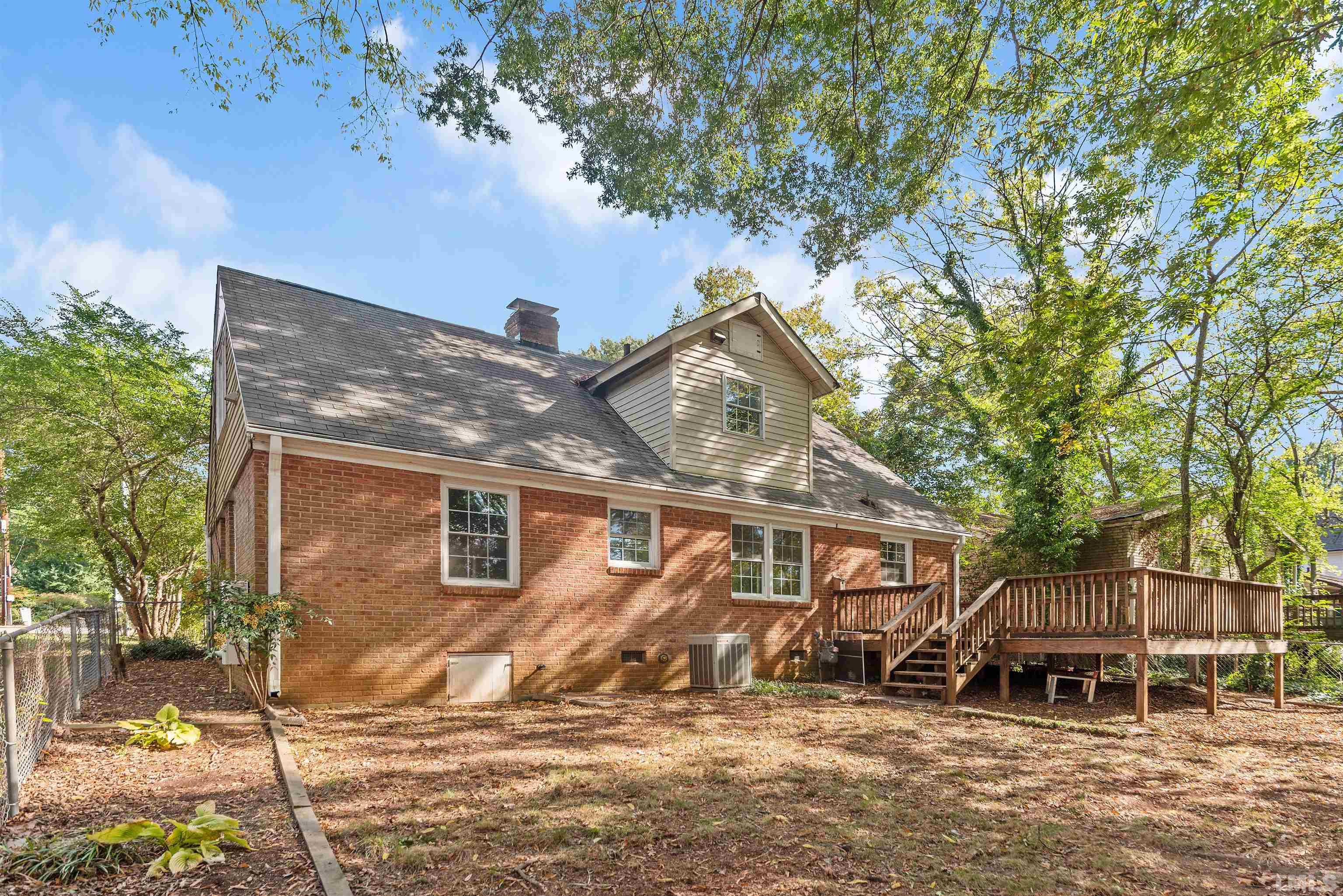 711 Latta Street Raleigh, NC 27607 - Photo 27 of 30 a front view of a house with a yard